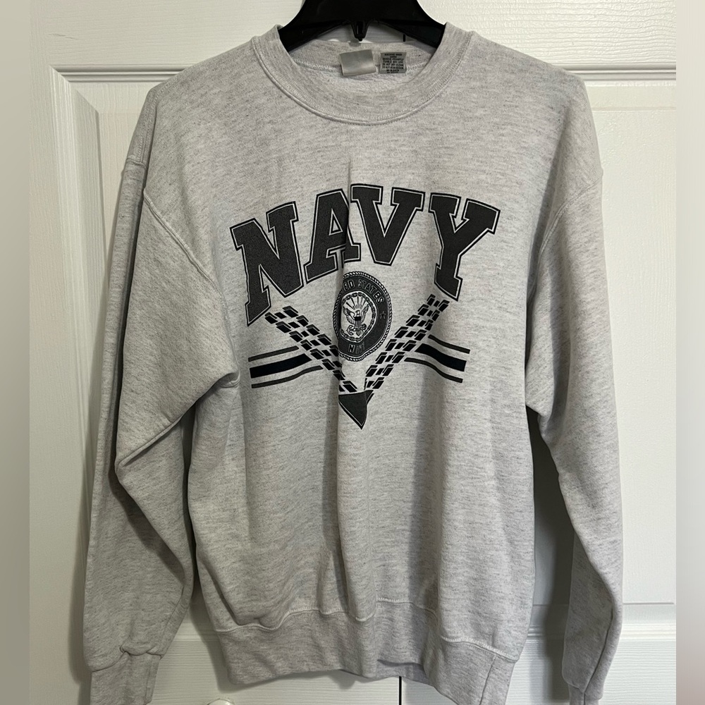 Navy sweatshirt. Size M. Navy on back is reflective.
